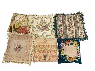 Lot 2516 - Floral embroidered tapestry and velvet cushions with tassel edging (6).