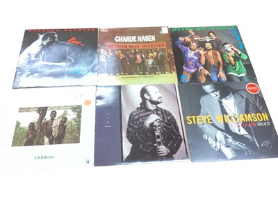 Lot 2720 - Two vintage cases of LP records featuring Pharoah Sanders, Eric Dolphy, Tommy Smith, Slide Hampton, Albert Ayler, Dizzy Gillespie, Bud Powell and Champion Jack Dupree etc. Vinyl inspected appear...
