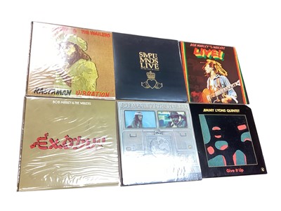 Lot 2722 - Vintage case of LP records featuring Simple Minds, Bob Marley, Charlie Mingus, Miles Davis, David Bowie, Rolling Stones, Blur and Nirvana. Vinyl inspected appears excellent condition.