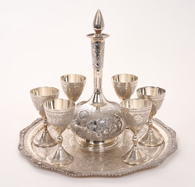 Lot 351 - Eastern white metal carafe and goblets set on matching tray