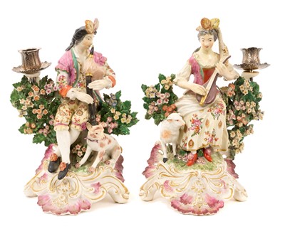 Lot 230 - Pair of 18th century Derby porcelain figural candlesticks
