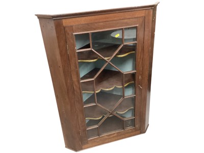 Lot 5309 - Georgian mahogany corner cupboard with shaped shelves enclosed by astragal glazed door, 77cm wide, 106cm high
