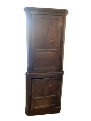 Lot 5312 - Antique oak two height corner cupboard with two panelled doors, 73cm wide, 192cm high