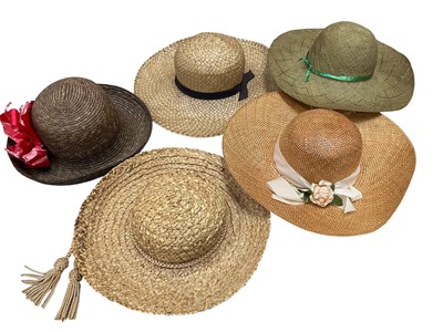 Lot 2509 - Quantity of 1940s to 1960s hats including 1950s Harrod's conical straw hat with starfish, conical pineapple hat, one other conical hat with red woven raffia, other straw beach hats. Wide brim...