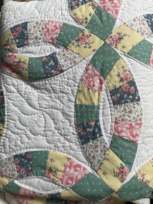 Lot 2522 - Four vintage hand and machine stitched patchwork quilts, including Arch Quilts New York, Double Wedding Ring quilt with scallop edge 160 x 220cms, Meandering Grandmother's Fan with scallop edge...
