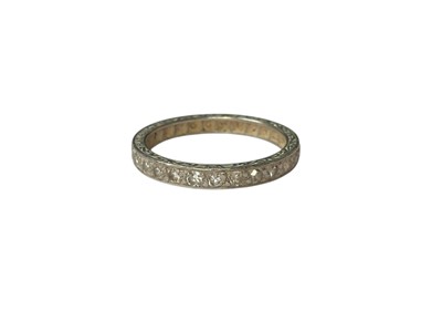 Lot 116 - Platinum and diamond full band eternity ring (one stone missing)