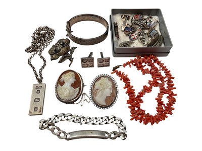 Lot 124 - Group of jewellery to include heavy silver identity bracelet, silver bangle, silver charm bracelet, two carved shell cameo brooches, coral necklace, two marcasite brooches and two pairs of silv...