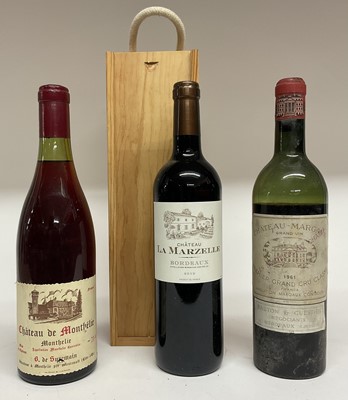 Lot 69 - Three bottles comprising: Chateau Margaux Premier Grand Cru 1961 (very low level), Chateau de Monthelie and Chateau La Marzelle 2012 (boxed)