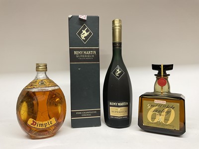 Lot 68 - Three bottles comprising: Remy Martin Fine Champagne Cognac, 1 litre, boxed, Suntory Old Scotch Whisky Royal 60 Special Reserve, John Haig Dimple Blended Scotch Whisky