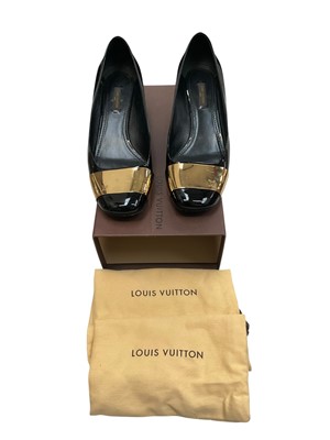 Lot 2529 - Louis Vuitton pair of black patent leather shoes, 4.5cm block heel and gold tone metal toe cap etched LV logo. Made it Italy size 41. Boxes plus soft dust bags.