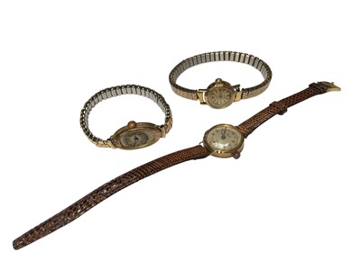 Lot 93 - Three vintage 9ct gold cased ladies' wristwatches, two with plated expandable bracelets and one with a leather strap