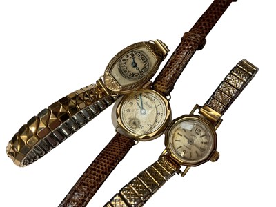 Lot 93 - Three vintage 9ct gold cased ladies' wristwatches, two with plated expandable bracelets and one with a leather strap