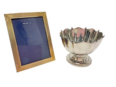 Lot 372 - Silver pedestal bowl with scalloped rim, and a silver gilt photo frame (2)
