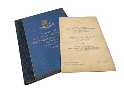 Lot 1374 - History of The 1st & 2nd battalions The North Staffordshire Regiment 1914-1923: 120 page book printed by Hughes & Harper limited with blue cover and gold blocked regimental badge to top,...