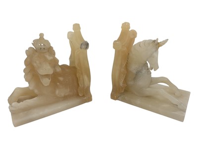 Lot 160 - Pair 1953 Coronation commemorative carved alabaster lion and unicorn bookends dated London 1953