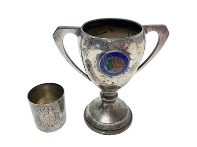 Lot 423 - Russian silver vodka cup and a silver trophy cup