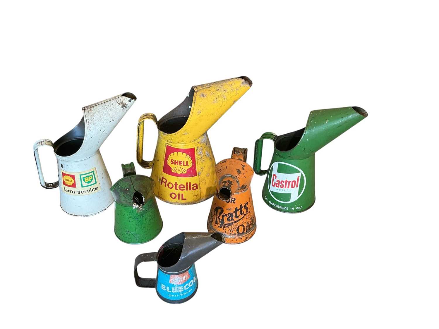 Lot 15 - Group of six vintage oil pouring jugs to include Shell, Castrol and Pratts (6)