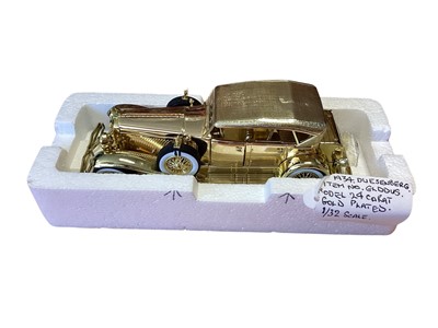 Lot 1773 - Historic Motor Museum Gold Plated 1:32 scale 1930 Packard, 1934 Duesenberg, 1932 Chrysler Lebaron & 1937 Cord 812 Supercharged model vehicles, in delivery packaging (4)