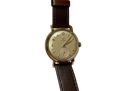 Lot 226 - 1950s gentlemen's Cyma 9ct gold cased wristwatch, 32mm diameter, on brown leather strap
