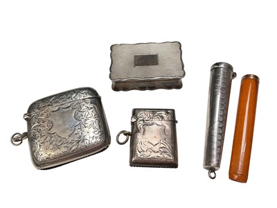 Lot 230 - 1960s silver snuff box, two Edwardian silver vesta cases and an amber and gold mounted cheroot holder in a silver case