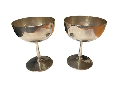 Lot 111 - Pair of Edwardian silver chalices / goblets (London 1907), 10.5cm high