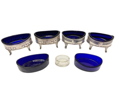 Lot 407 - Pair of Georgian oval silver salts with blue glass liners and another similar pair