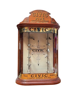 Lot 2901 - Civic mahogany pipe display cabinet, stamped registered design number 556025 - applied ivorine plaque to rear