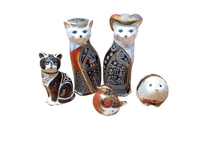 Lot 2230 - Pair of limited edition Royal Crown Derby paperweights - Pearly King and Queen, no.301 of 350, together with three others (5)
