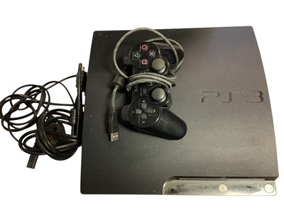 Lot 1799 - PlayStation 3 consul with accessories and PS1 & PS3 games (1 box)