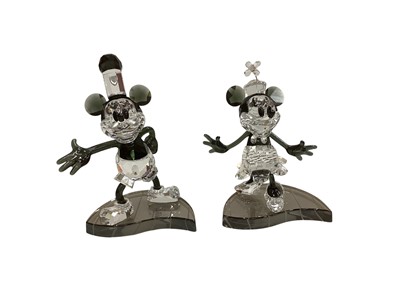 Lot 2231 - Two Swarovski Disney figures - Steamboat Willie and Minnie Mouse