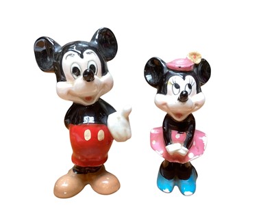 Lot 2241 - Two Walt Disney figures - Mickey and Minnie Mouse, 16cm and 14cm high