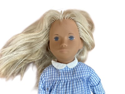 Lot 1873 - Early Blonde Sasha doll dressed in blue gingham dress, socks and shoes.