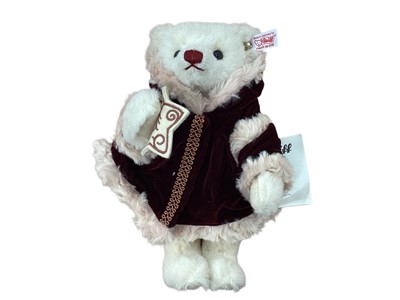 Lot 1855 - Steiff 034749 Christmas Musical Teddy Bear, boxed with certificate.