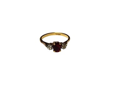 Lot 132 - 18ct gold ruby and diamond three stone ring