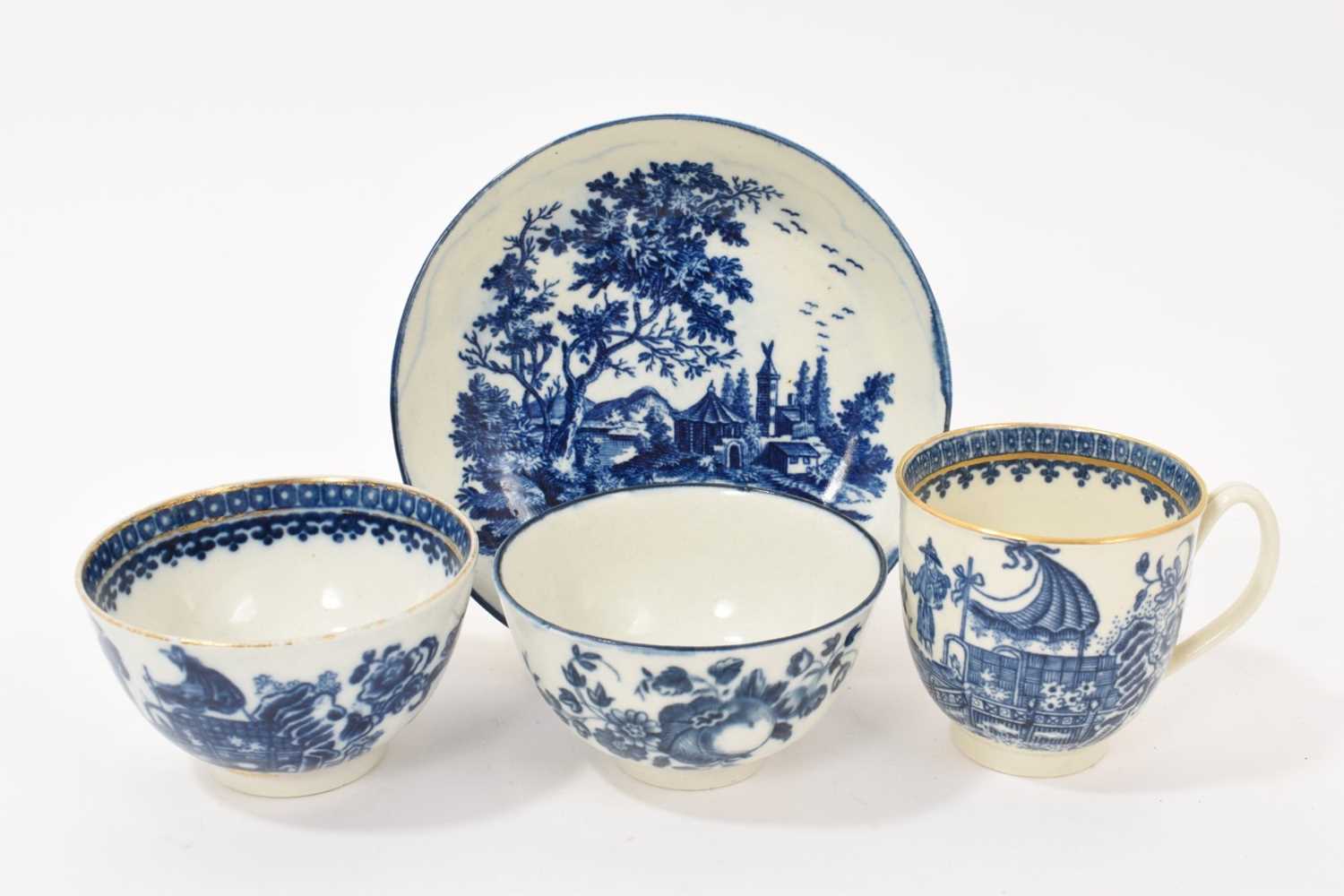 Lot 5043 - Worcester European Landscapes pattern saucer, a Worcester tea bowl, a Worcester coffee cup and a Caughley tea bowl