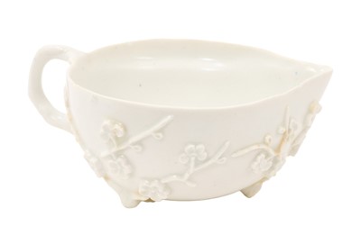 Lot 54 - Rare Bow peach form small sauceboat, applied with prunus, circa 1750-52