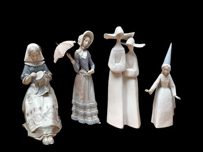 Lot 2253 - Four Lladro porcelain figures including Insular Embroideress model no.4865
