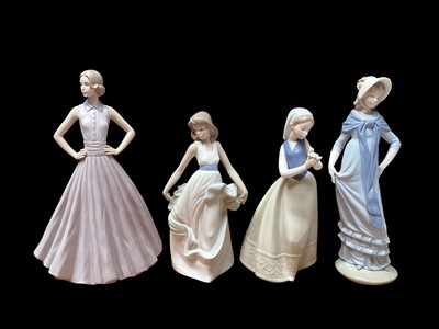 Lot 2255 - Four Nao porcelain figures including Proud Pose