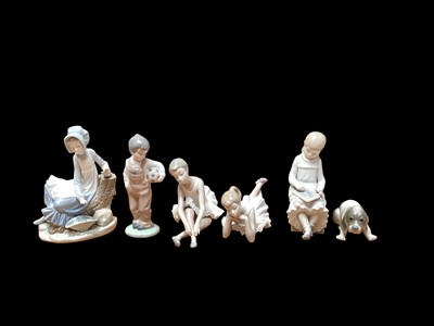 Lot 2257 - Five Nao porcelain figures including two ballerinas, together with two other ornaments