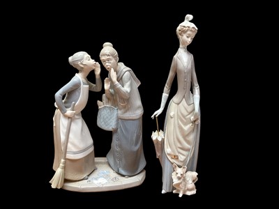 Lot 2261 - Two Lladro porcelain figures - The Gossips, model no.4984 and Lady with dog (both boxed)