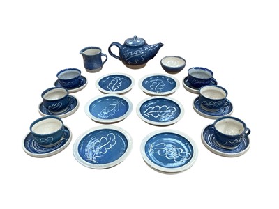 Lot 5028 - Studio pottery blue and white glazed teaset, all pieces stamped with m (21 pieces)