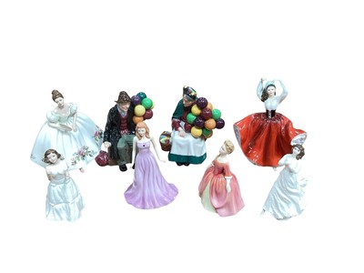 Lot 2282 - Eight Royal Doulton figures including The Old Balloon Seller and The Balloon Man