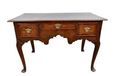 Lot 1402 - George III oak three drawer lowboy, raised on shaped apron and carved cabriole legs, 110cm wide x 56cm deep x 75cm high