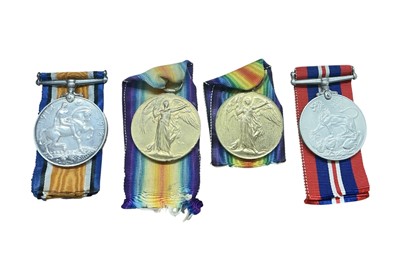 Lot 702 - First World War pair comprising War and Victory medals named to 62455 GNR. J. T. Patterson. R. A. together with another First World War Defence medal named to 8758 PTE. G. Canning. Dorset. R. an...
