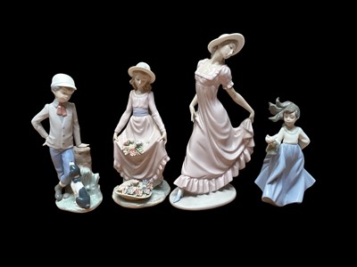 Lot 2286 - Four NAO porcelain figures including Affectionate Pup, all boxed