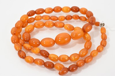 Lot 657 - Antique amber bead necklace