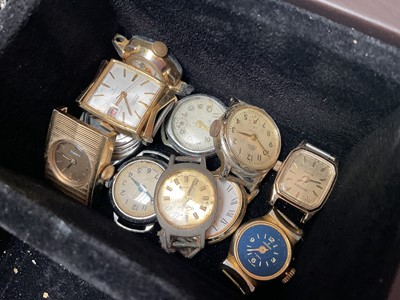 Lot 95 - Collection of vintage and later wristwatches, watch movements, straps and various parts, within a watch display box