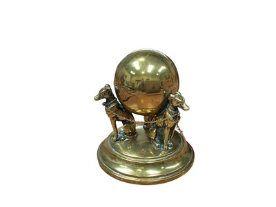 Lot 5022 - Brass inkwell in the form of three seated dogs supporting a round inkwell