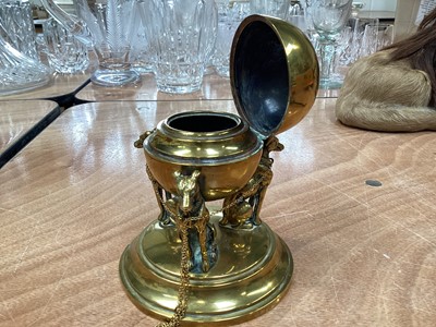 Lot 5022 - Brass inkwell in the form of three seated dogs supporting a round inkwell