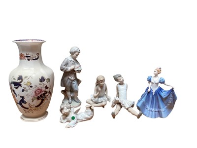 Lot 2289 - Two Lladro porcelain figures including Doncel with Roses, together with two Nao figures, Royal Doulton figure and a Masons vase, mostly boxed (6)
